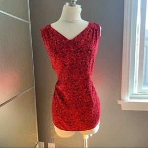 Speckled red sleeveless shirt